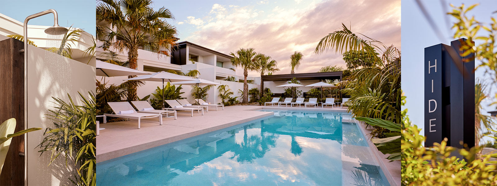 Hide Byron Bay adults-only wellness retreat pool area with sun loungers, tropical landscaping, and outdoor shower — boutique luxury accommodation in Byron Bay, NSW