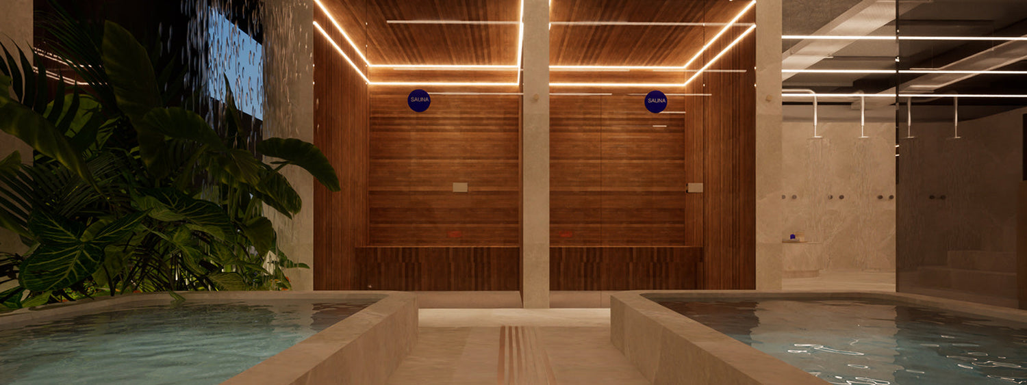 RCVRI Martin Place contrast therapy zone with dual plunge pools, warm lighting, sauna, and modern wellness design
